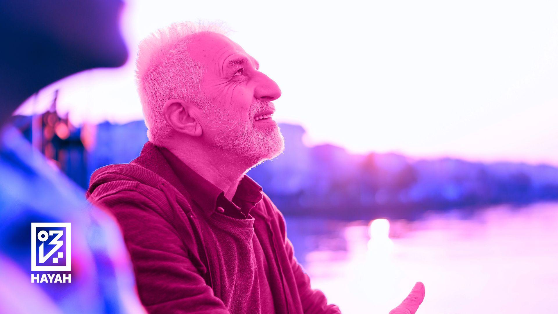 old man enjoying the view of the sky